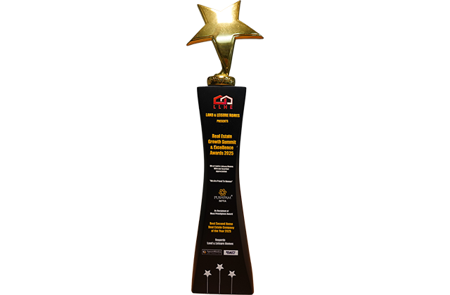 Best Second Home Real Estate Company of the Year 2025 trophy, presented by Land & Leisure Homes' Real Estate Growth Summit & Excellence Awards, awarded to Pushpam Infra